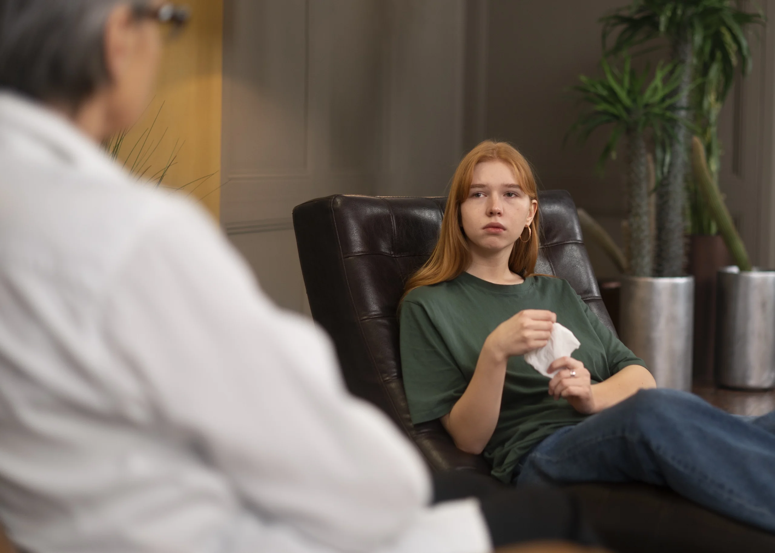 authentic scene young person undergoing psychological therapy